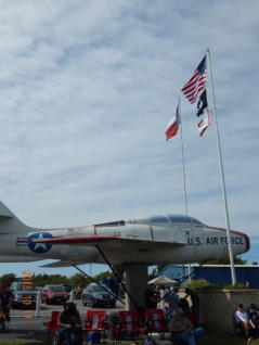 Community gathering at Post 490 under the F-84F