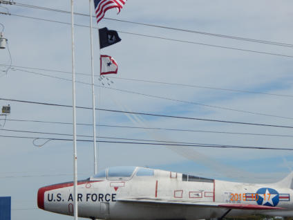 F-84F with American flag and POW/MIA flag at Post 490