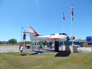 Volunteers restoring F-84F fuselage