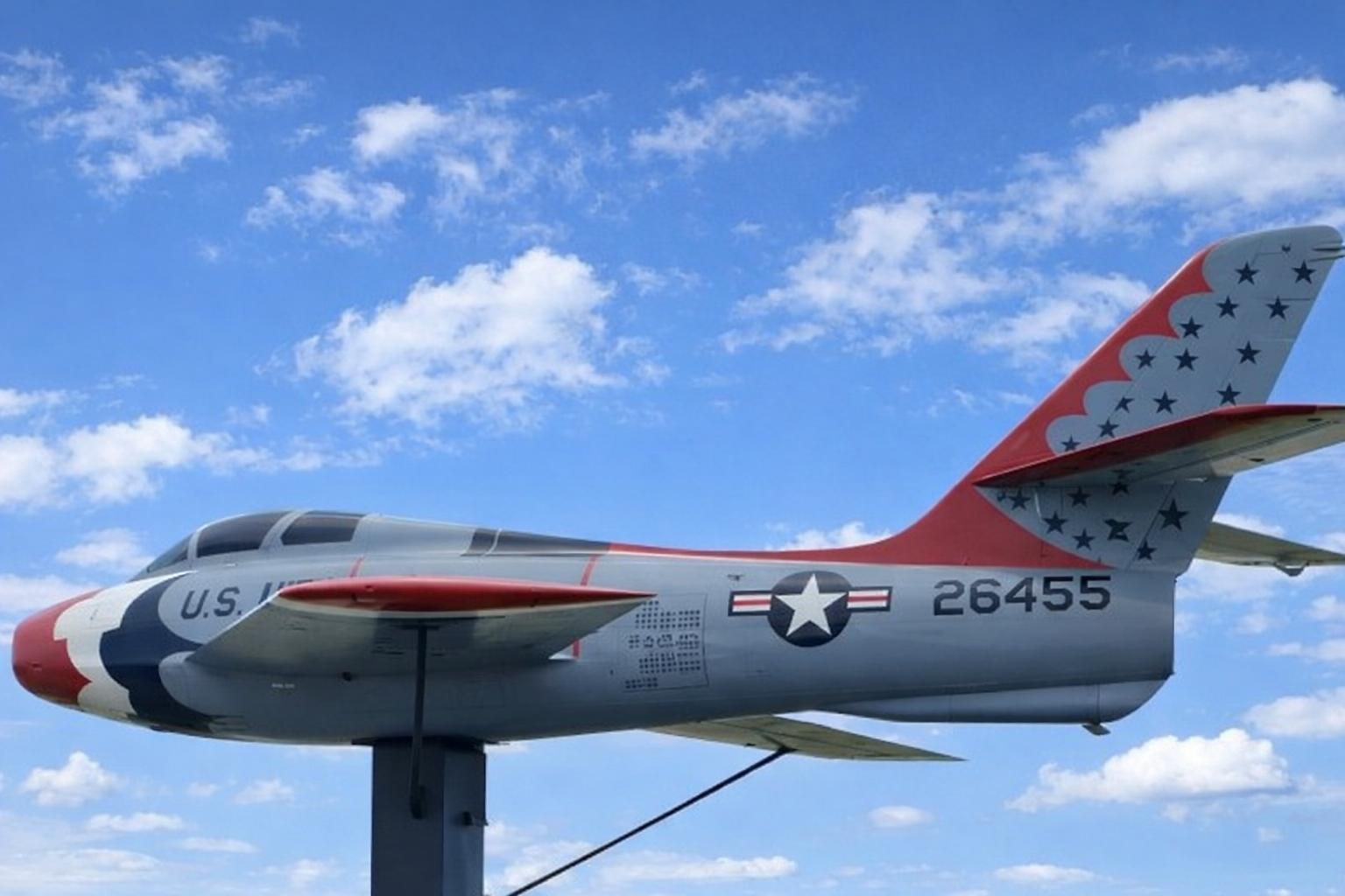 F-84F Thunderstreak S/N 26455 in Thunderbird livery against blue Texas sky